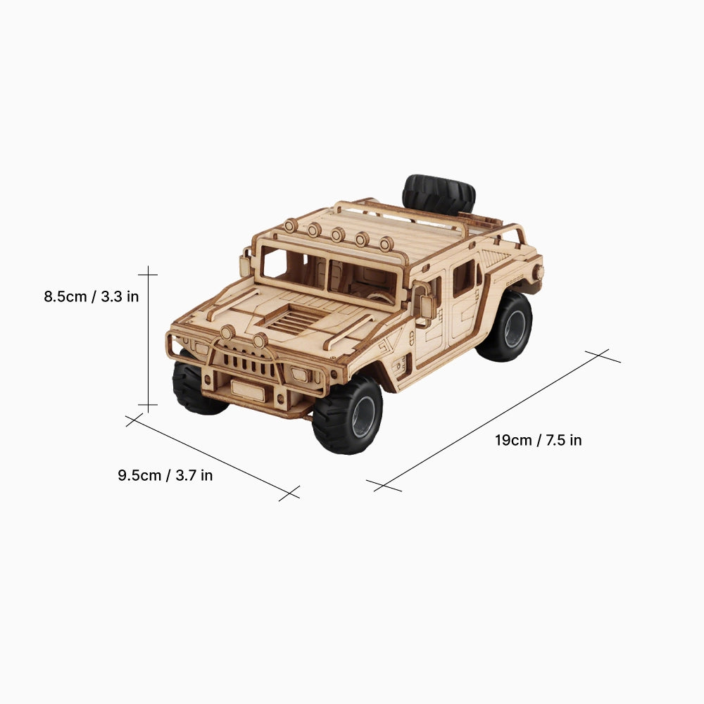 Wooden model of a military vehicle with dimensions indicated on a white background